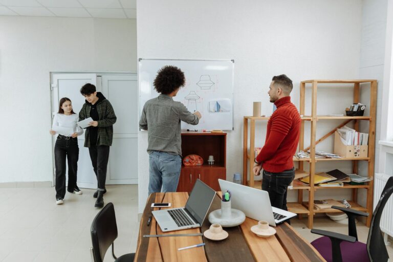 Team collaborating laptop