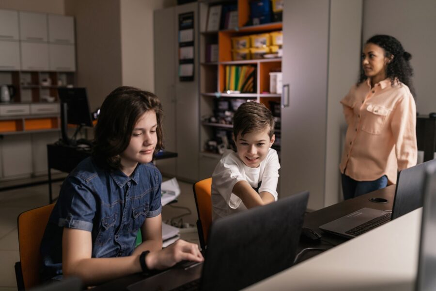 Teacher using laptop
