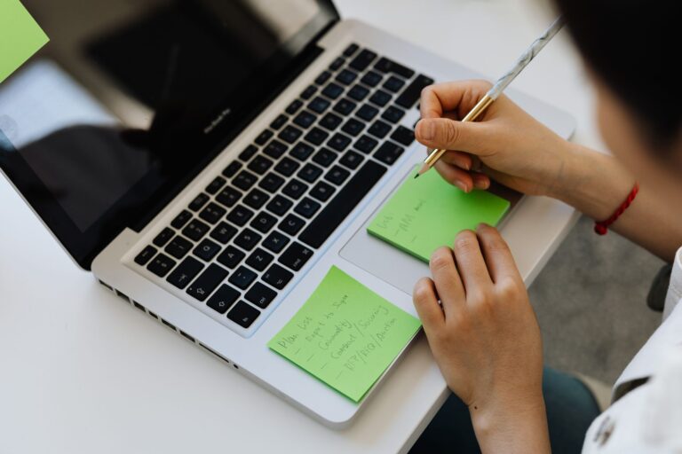 Person typing laptop