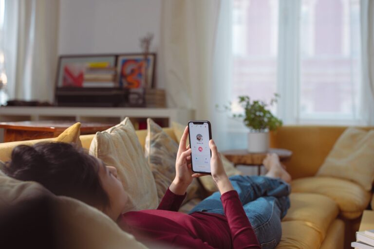 Woman reading smartphone